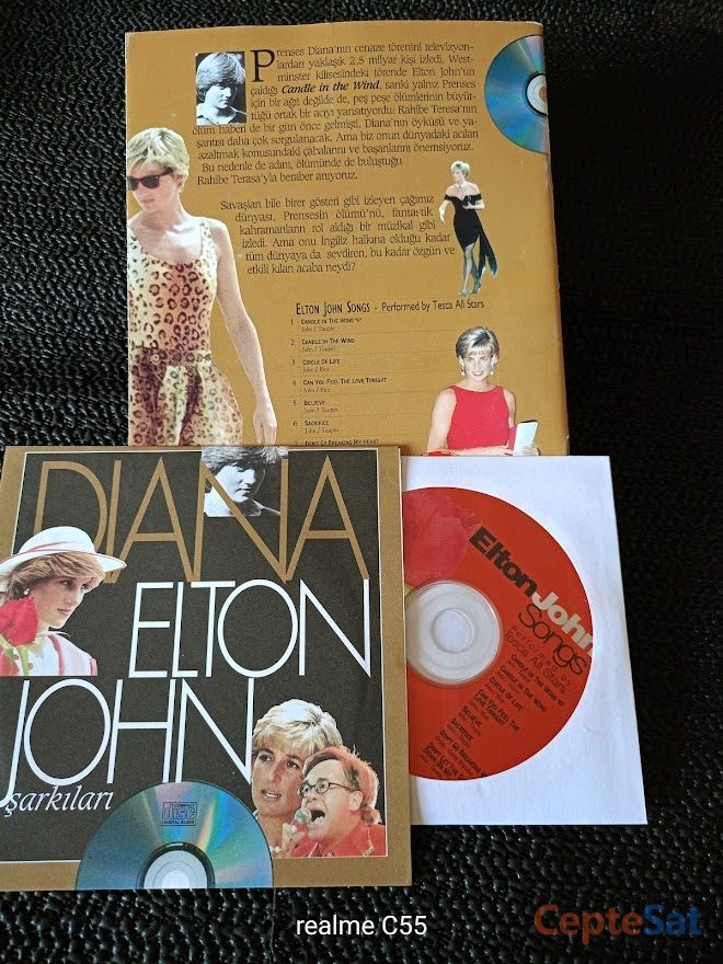 PRENSES DIANA ve ELTON JOHN ŞARKILARI. KİTAPCIK + CD İLE BERABER. BU KİTAPCIKDA PRENSES DİANA, RAHİBE TERESA ,VERSACE ,ELTON JOHN GİBİ ÜNLÜLER İLE İLGİLİ KISA B - İstanbul Beşiktaş